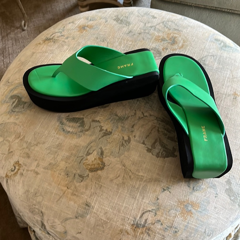 Funky green wedge flip flops.